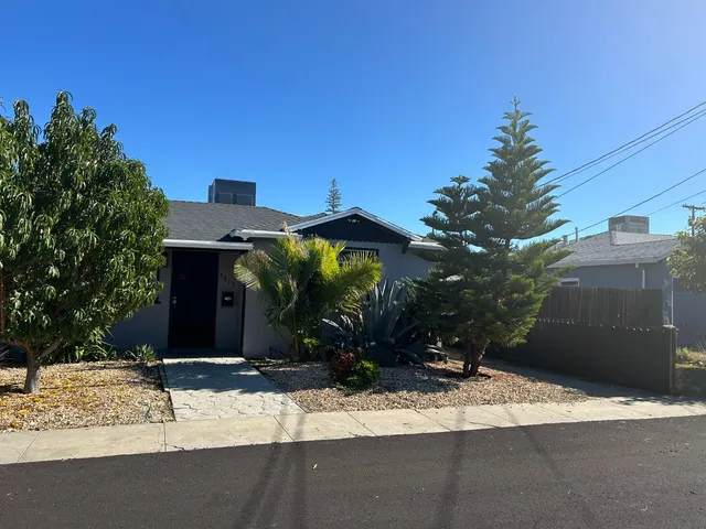a view of a pathway with a bench