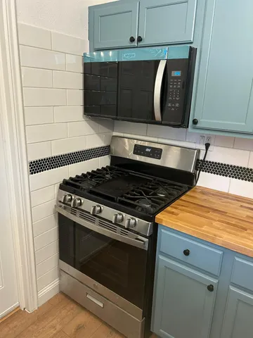 a bathroom with a white bath tub