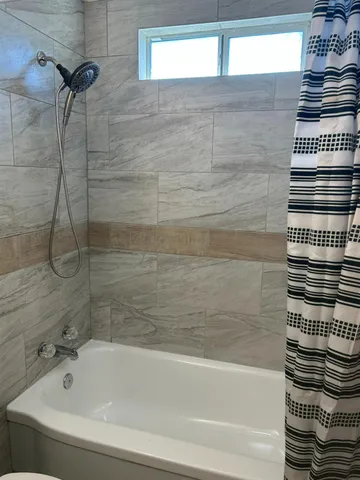 a view of swimming pool with outdoor seating