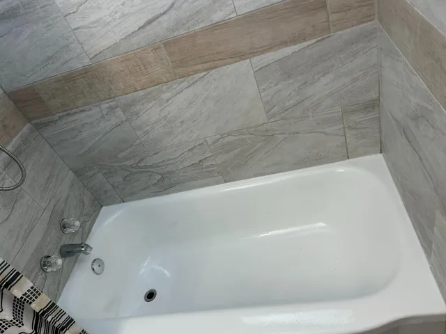 a view of swimming pool with lounge chair and dinning table