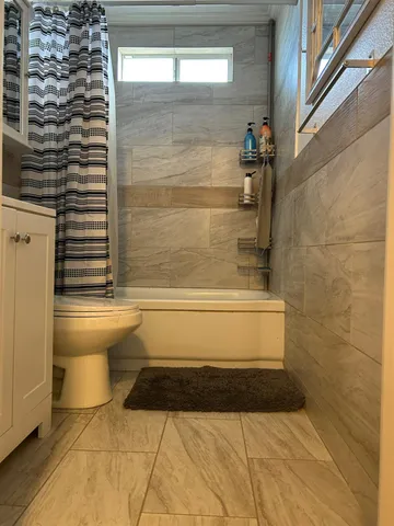 a view of swimming pool with outdoor seating