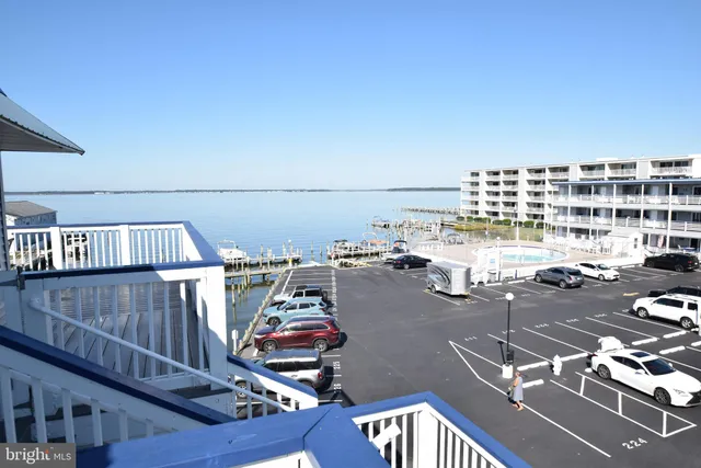 a view of a balcony with chairs