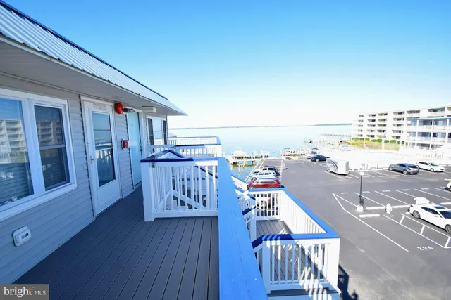 a view of roof deck with patio