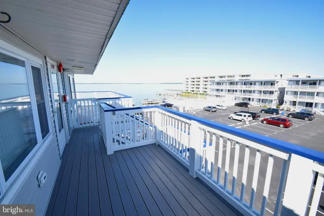 a view of balcony with furniture