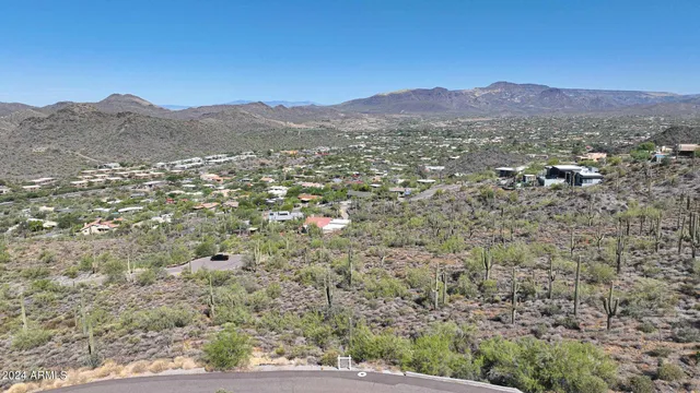 a view of mountains and valleys