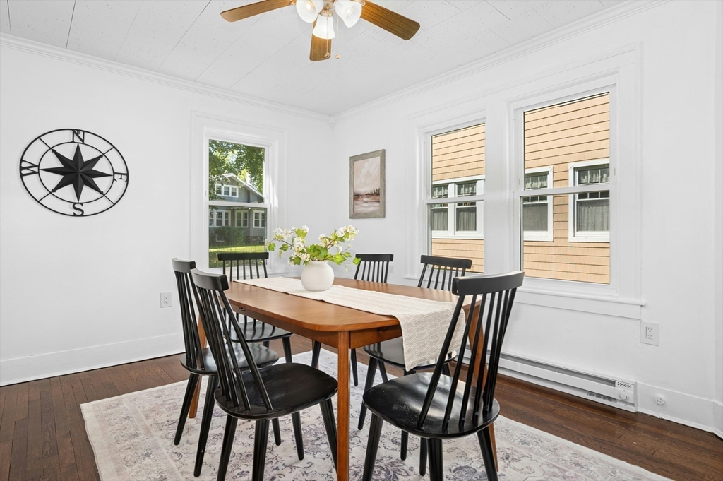 5 Coombs Road Worcester, MA 01602 - Photo 13 of 38 a view of a dining room with furniture window and wooden floor