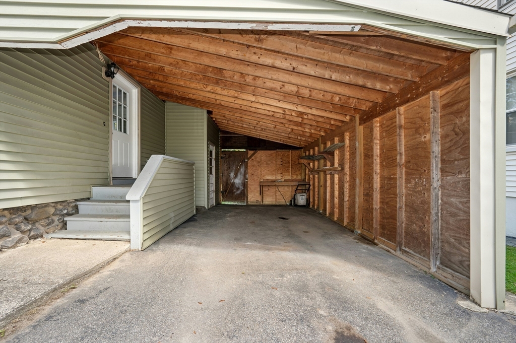 5 Coombs Road Worcester, MA 01602 - Photo 29 of 38 a view of a wooden door and a window