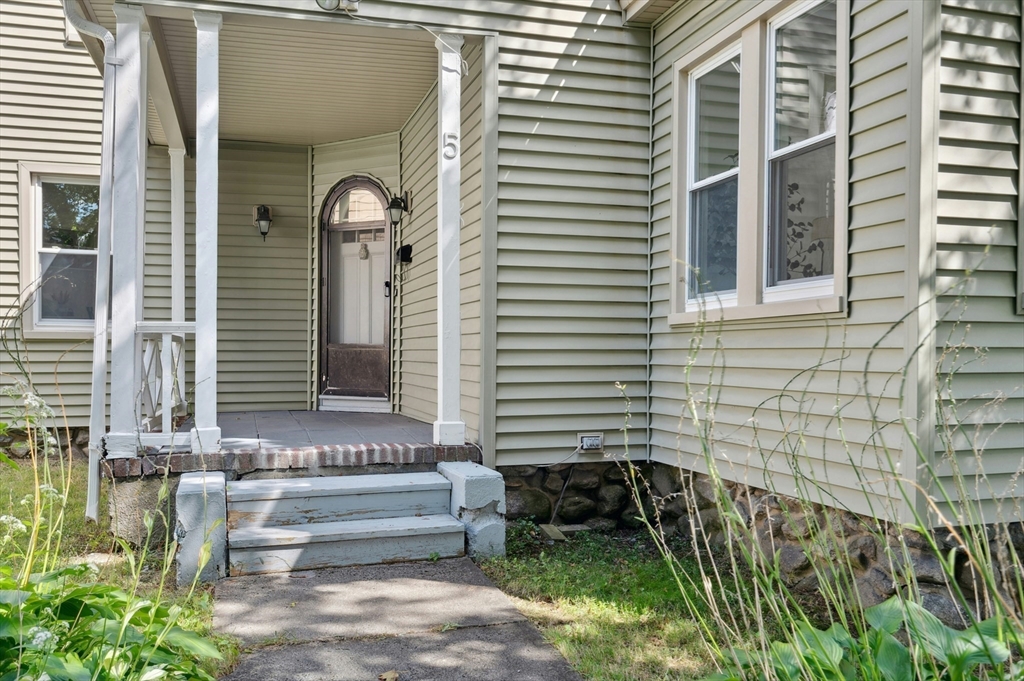 5 Coombs Road Worcester, MA 01602 - Photo 35 of 38 a front view of a house with a garden