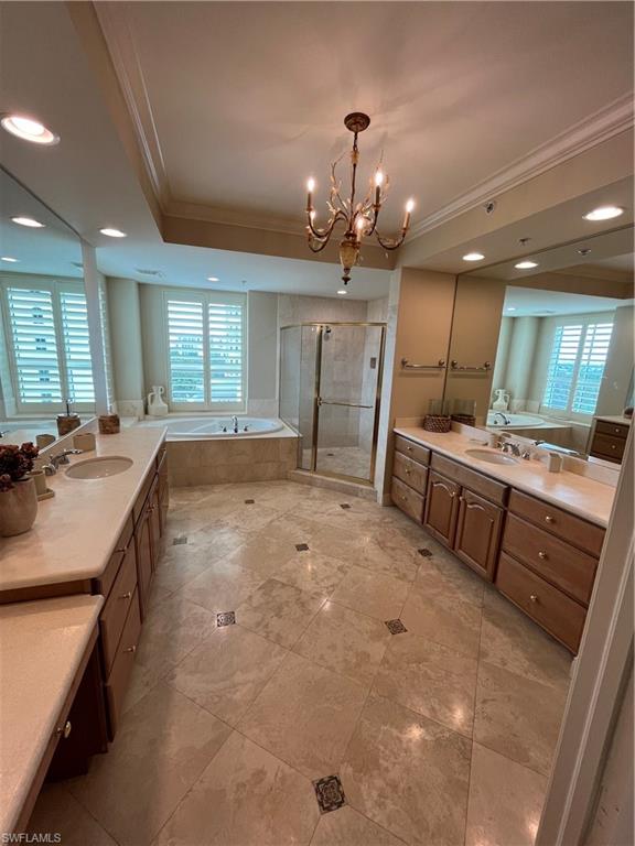 285 Grande Way, Unit 701 Naples, FL 34110 - Photo 15 of 20 a large kitchen with a large counter top appliances and cabinets