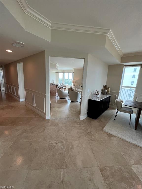 285 Grande Way, Unit 701 Naples, FL 34110 - Photo 5 of 20 a living room with furniture and a couch
