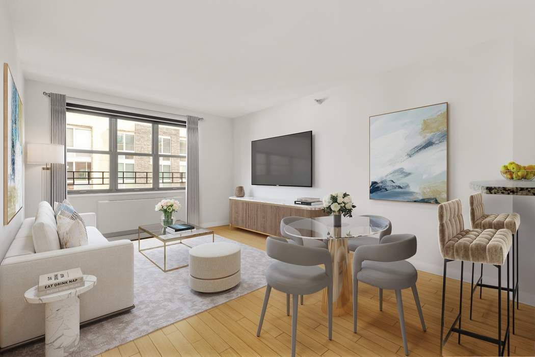 516 West 47th Street, Unit N6A Manhattan, NY 10036 - Photo 1 of 16 a living room with furniture and a flat screen tv