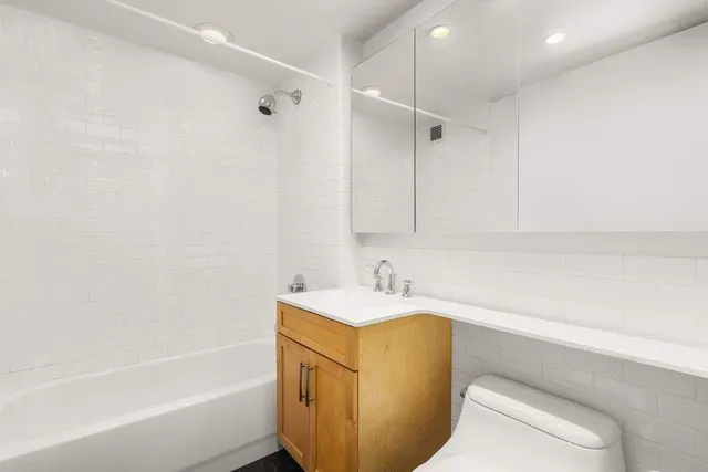 a bathroom with a sink and a bathtub