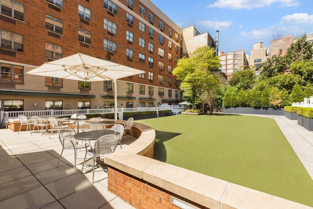 516 West 47th Street, Unit N6A Manhattan, NY 10036 - Photo 9 of 16 a view of a swimming pool with a patio