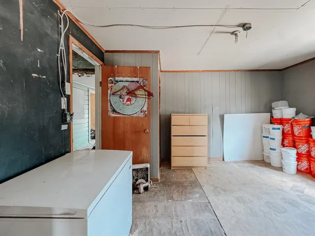 a view of room with furniture and closet