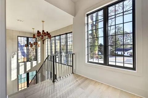 a bathroom with a granite countertop double vanity sinks and a mirror