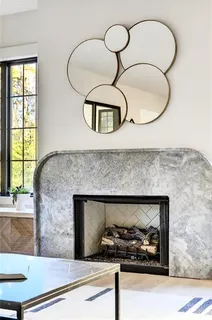 a view of living room with granite countertop furniture and a large window