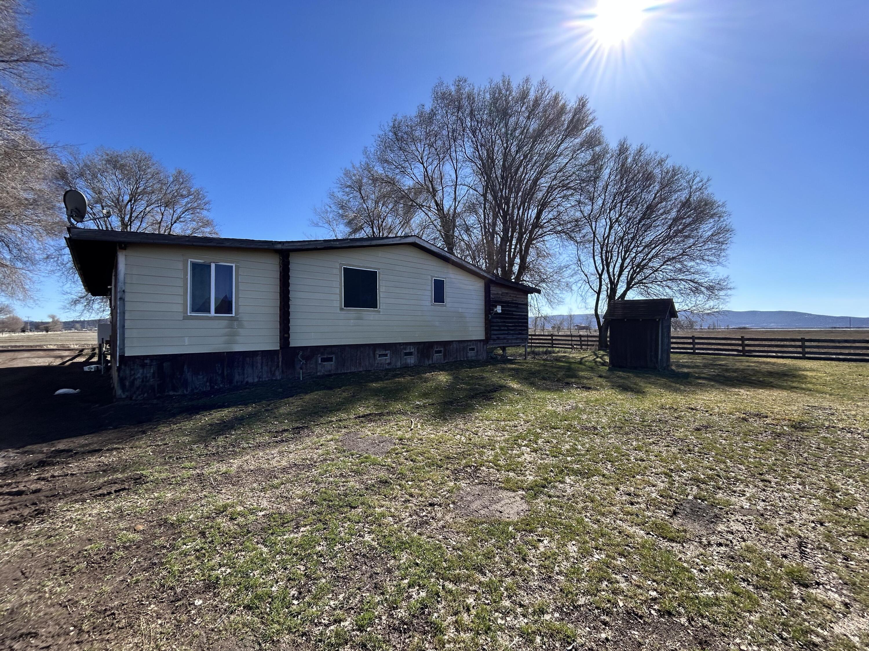 553-185 Punkin Center Road Bieber, CA 96009 - Photo 36 of 57 a view of a house with a yard