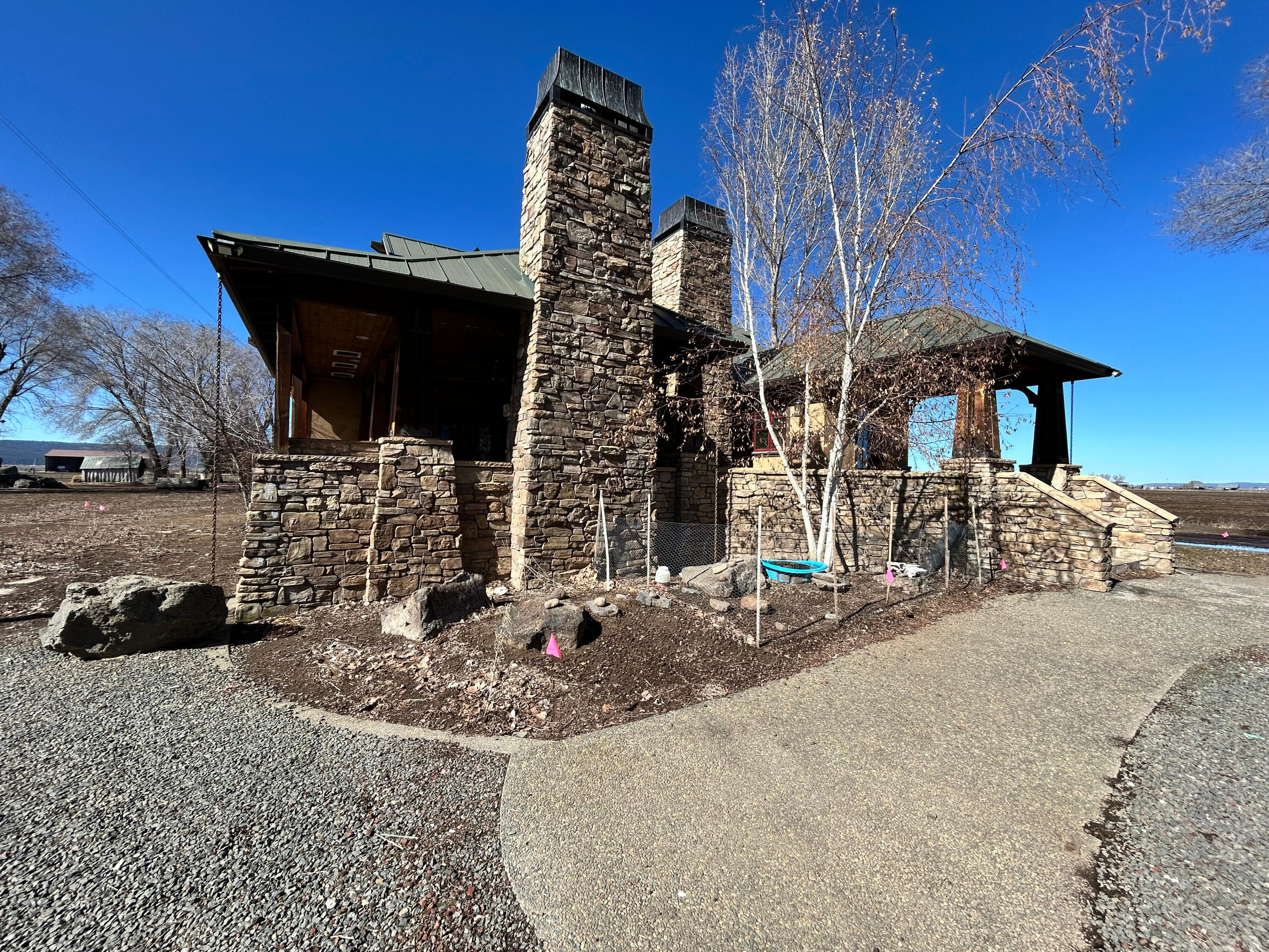 553-185 Punkin Center Road Bieber, CA 96009 - Photo 38 of 57 a view of a house with a patio