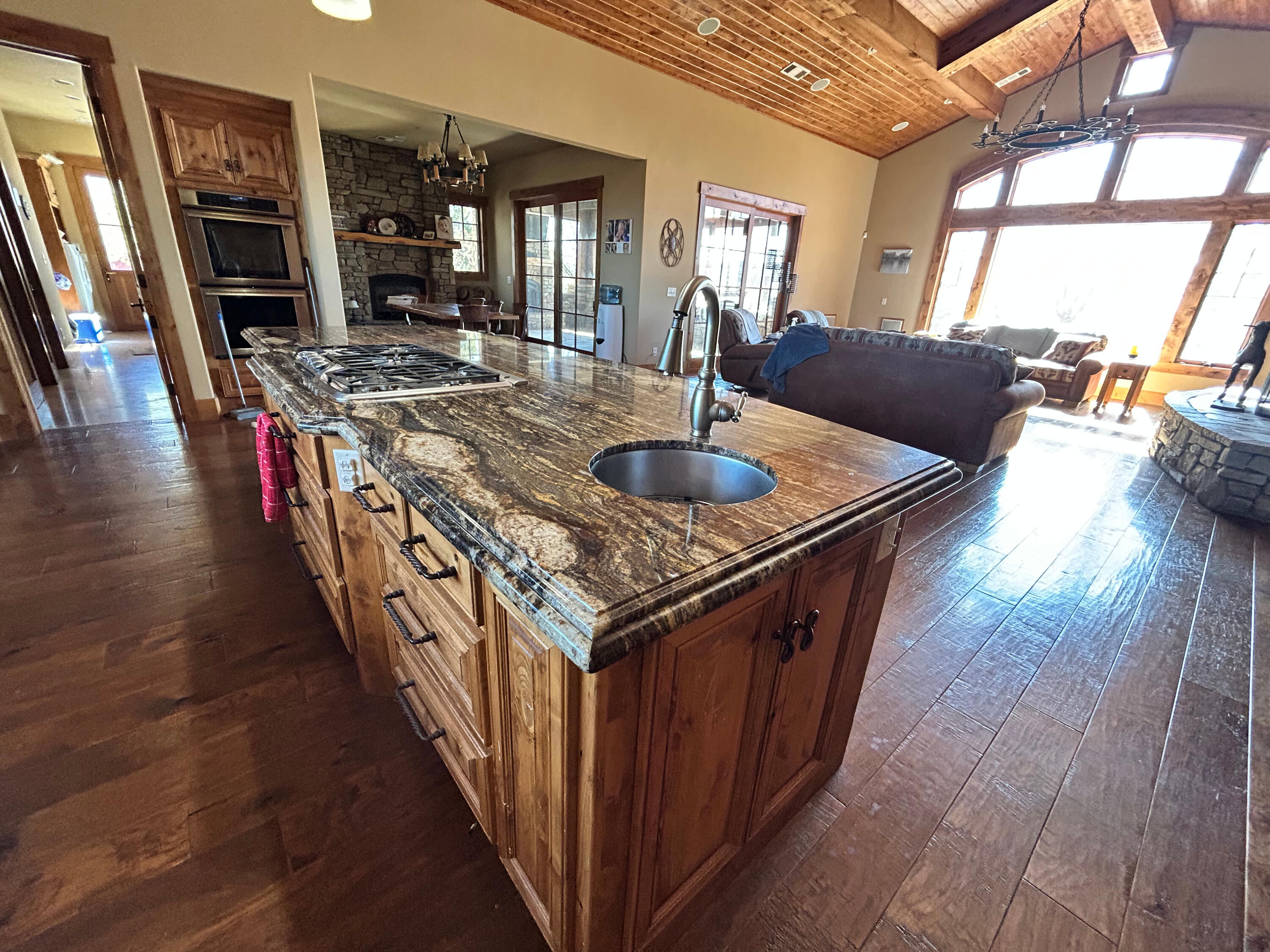 553-185 Punkin Center Road Bieber, CA 96009 - Photo 48 of 57 a kitchen with stainless steel appliances granite countertop a table and chairs