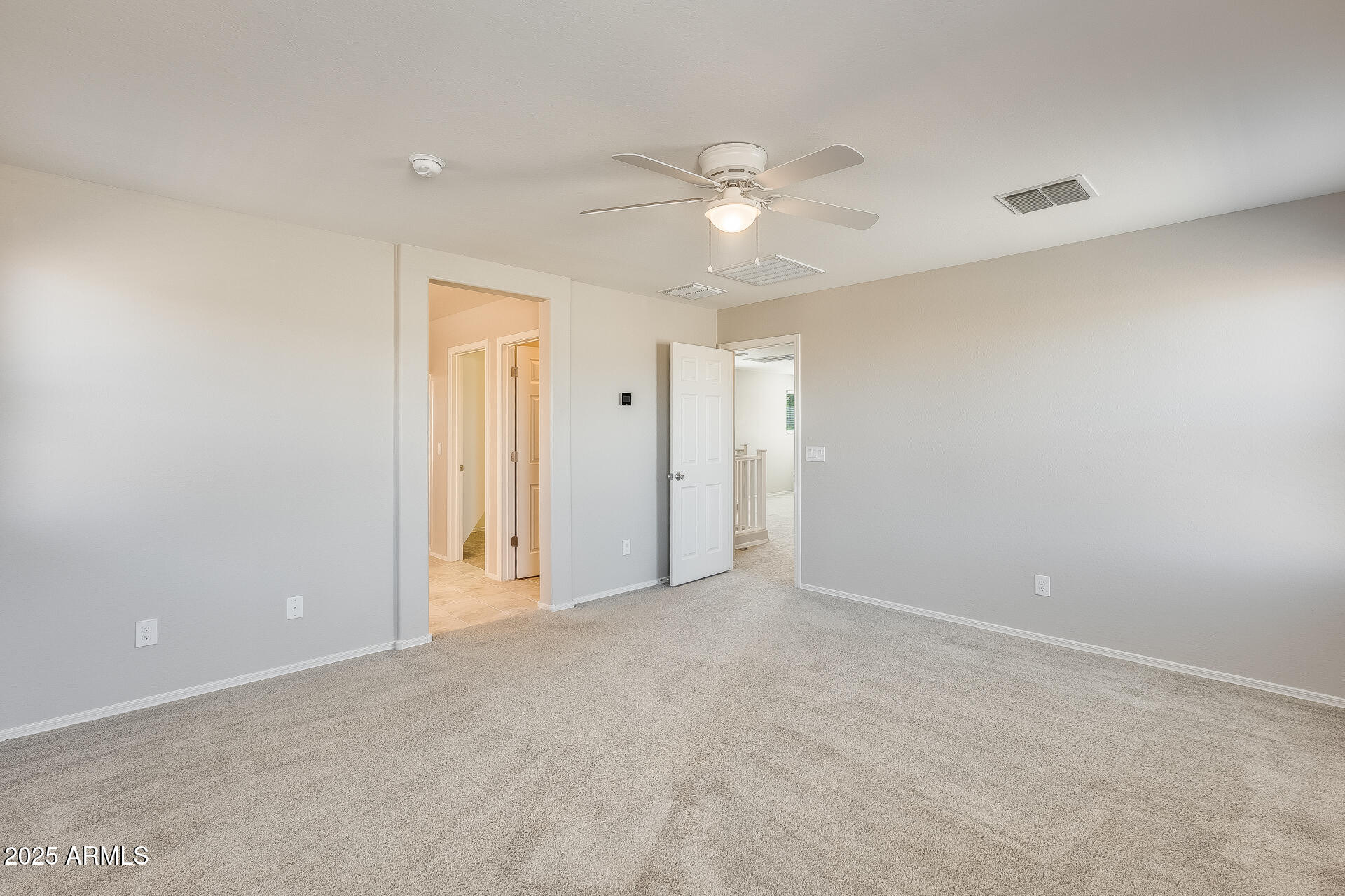 1132 South Amulet Mesa, AZ 85208 - Photo 21 of 37 a view of an empty room with a ceiling fan