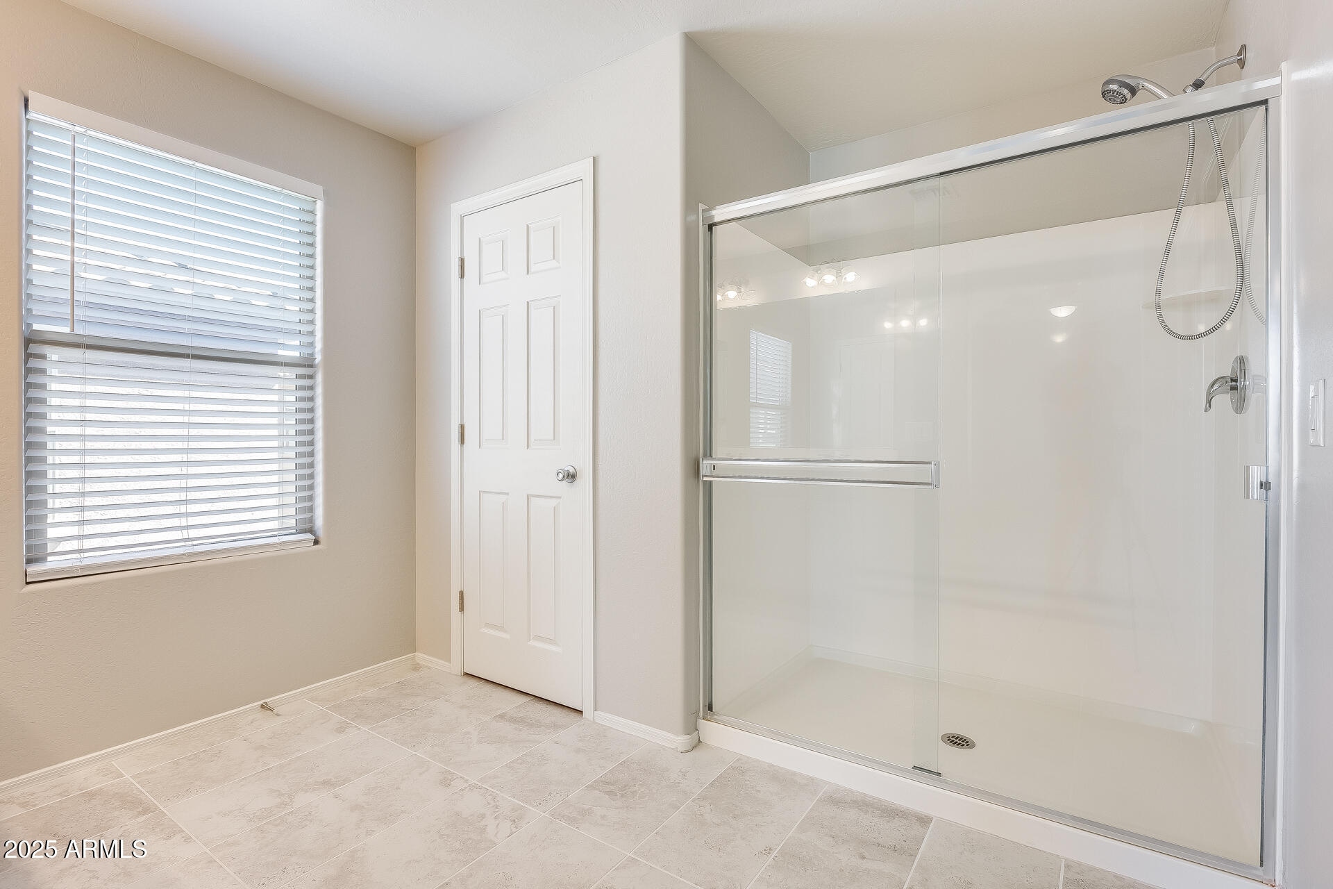 1132 South Amulet Mesa, AZ 85208 - Photo 23 of 37 a bathroom with a glass shower door