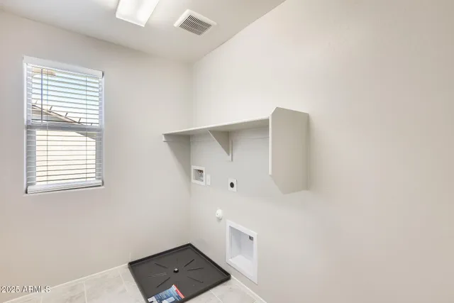 a bathroom with a sink double vanity and a mirror