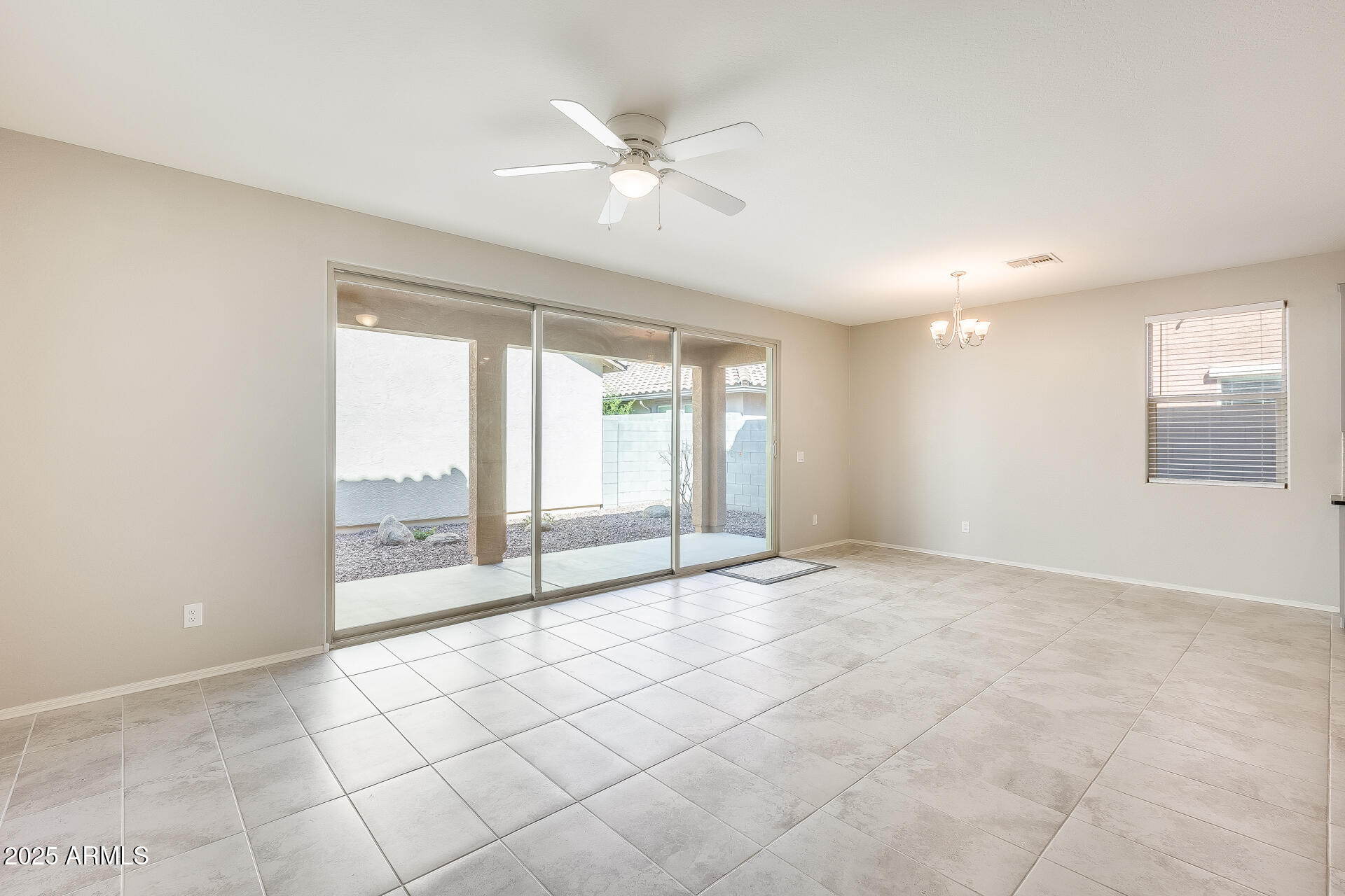 1132 South Amulet Mesa, AZ 85208 - Photo 7 of 37 a view of an empty room with a window