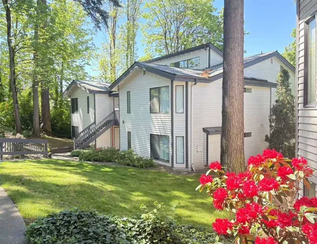 a view of a house with swimming pool
