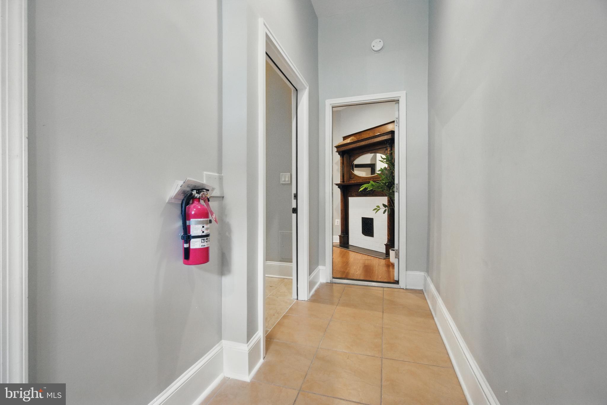 28 T Street Northwest, Unit 3 Washington, DC 20001 - Photo 11 of 34 a view of a hallway with wooden shelves