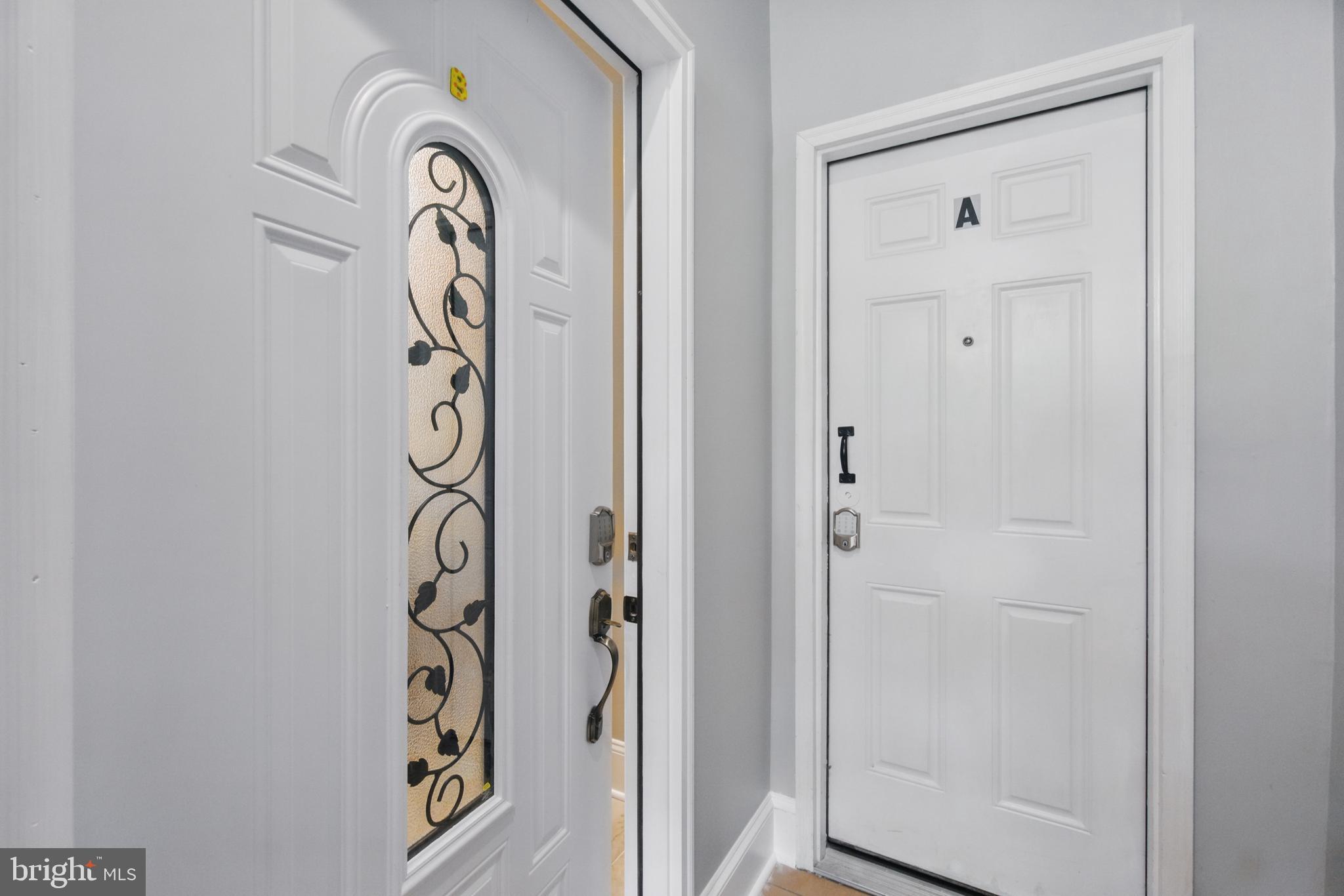 28 T Street Northwest, Unit 3 Washington, DC 20001 - Photo 12 of 34 wooden door with window and glass door