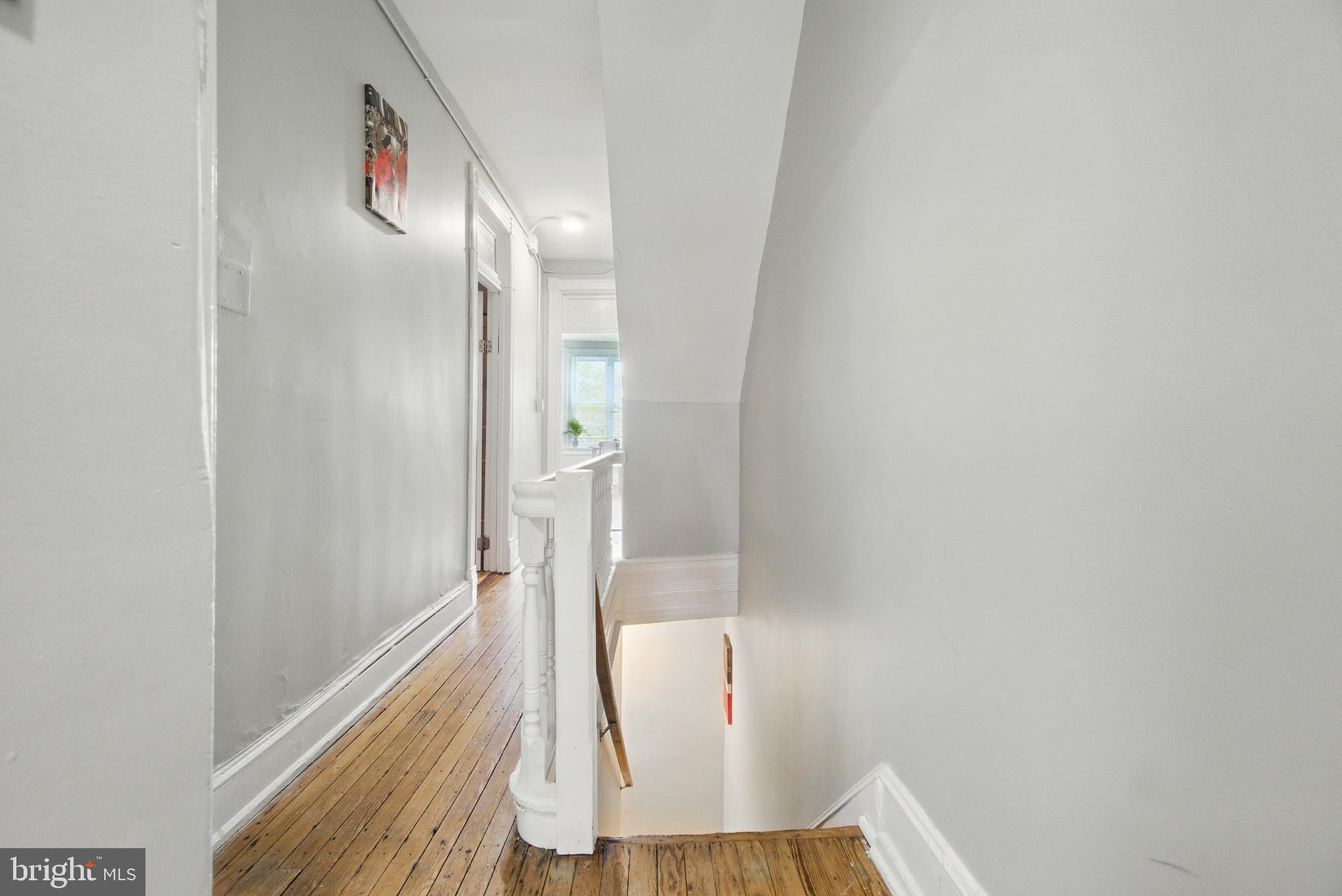 28 T Street Northwest, Unit 3 Washington, DC 20001 - Photo 14 of 34 a view of a hallway with wooden floor and staircase