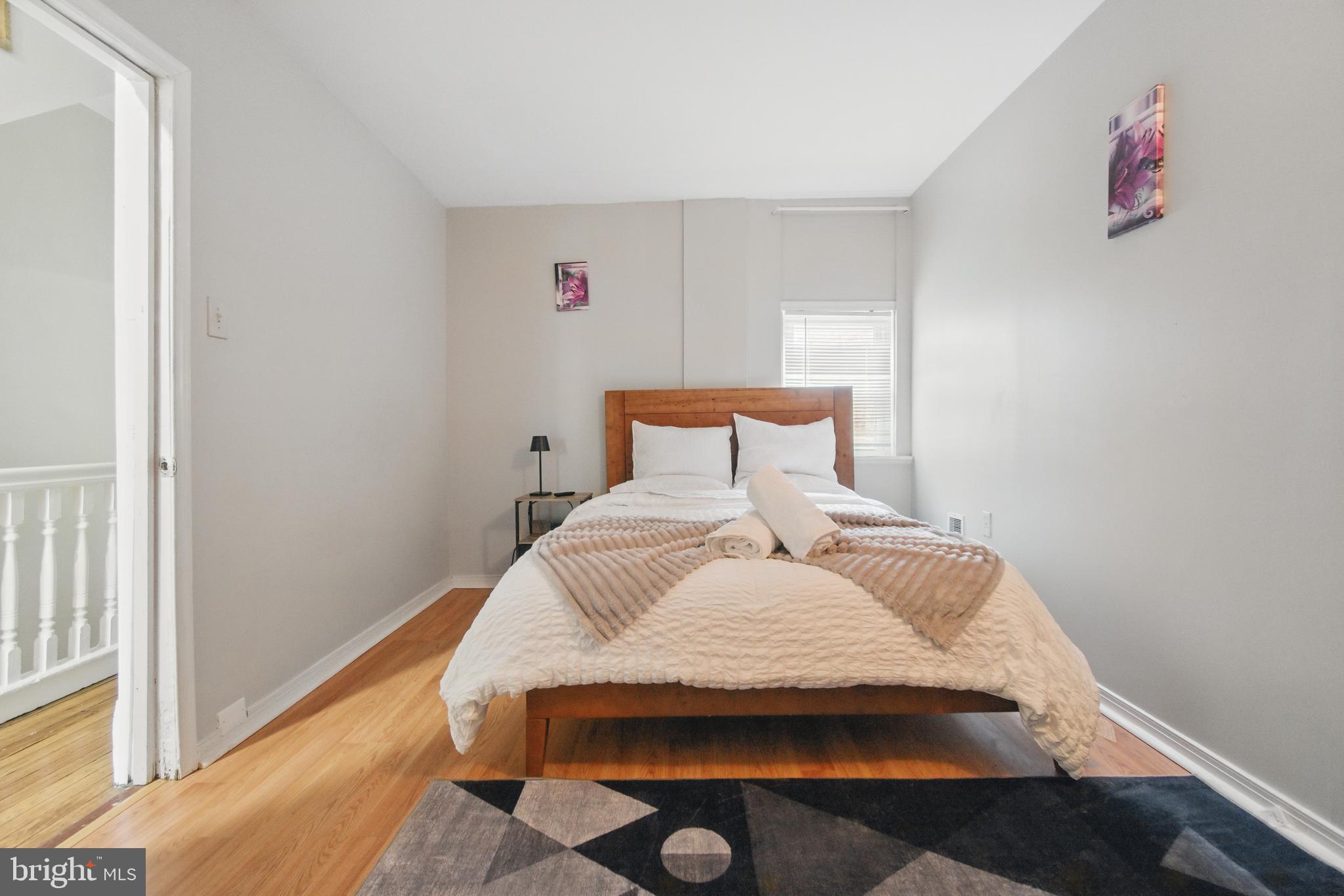 28 T Street Northwest, Unit 3 Washington, DC 20001 - Photo 18 of 34 a bedroom with a bed and a window