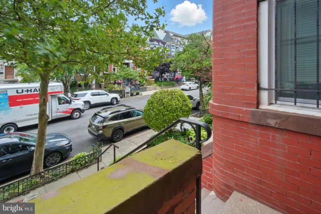 a view of a chairs and table in the patio