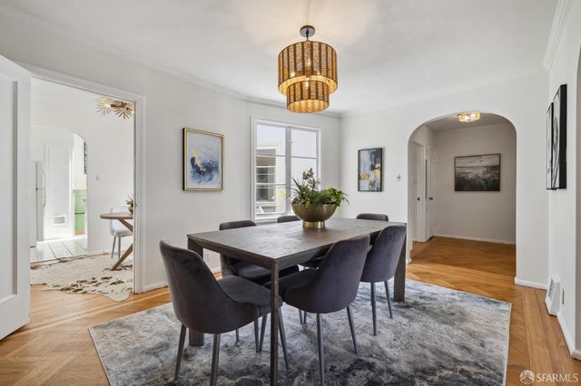 a view of a dining room with furniture