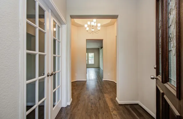 a view of entryway with wooden floor