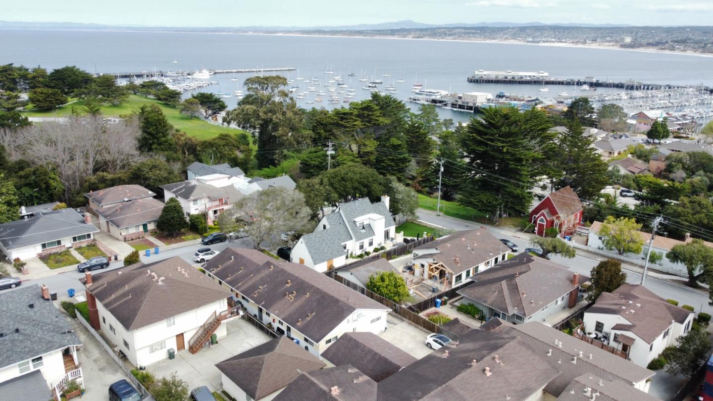 an aerial view of a house with outdoor space