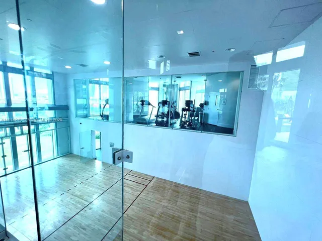 a view of a hallway with livingroom