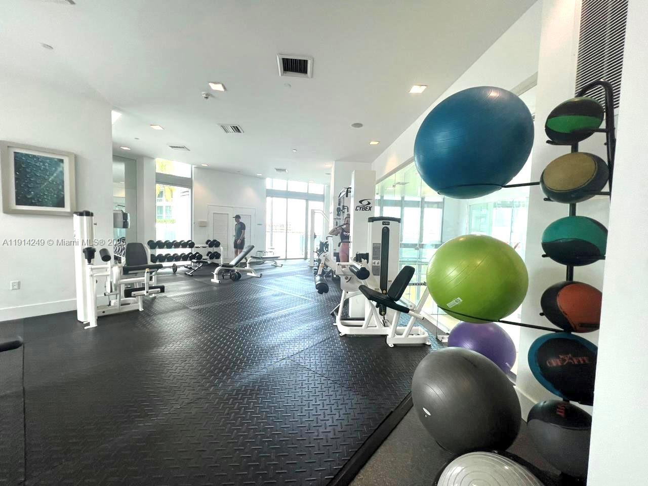 350 South Miami Avenue, Unit 1502 Miami, FL 33130 - Photo 26 of 30 a living room with furniture and wooden floor