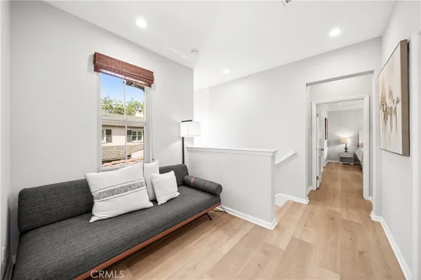 a bedroom with bed and a window