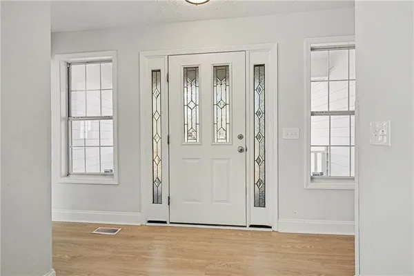 an empty room with windows