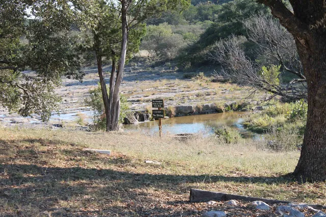 a picture of a wall with a white comforter