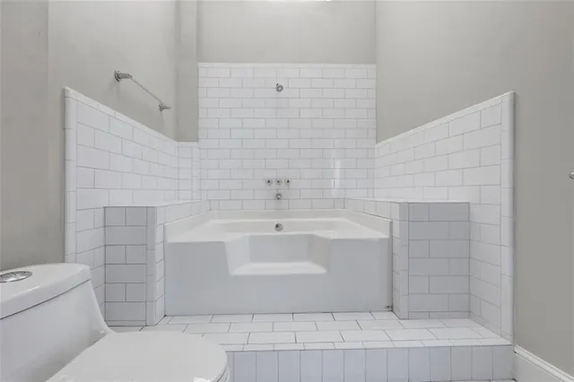 a bathroom with a sink and toilet