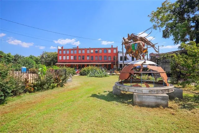 a childrens park with lots of swings and slides