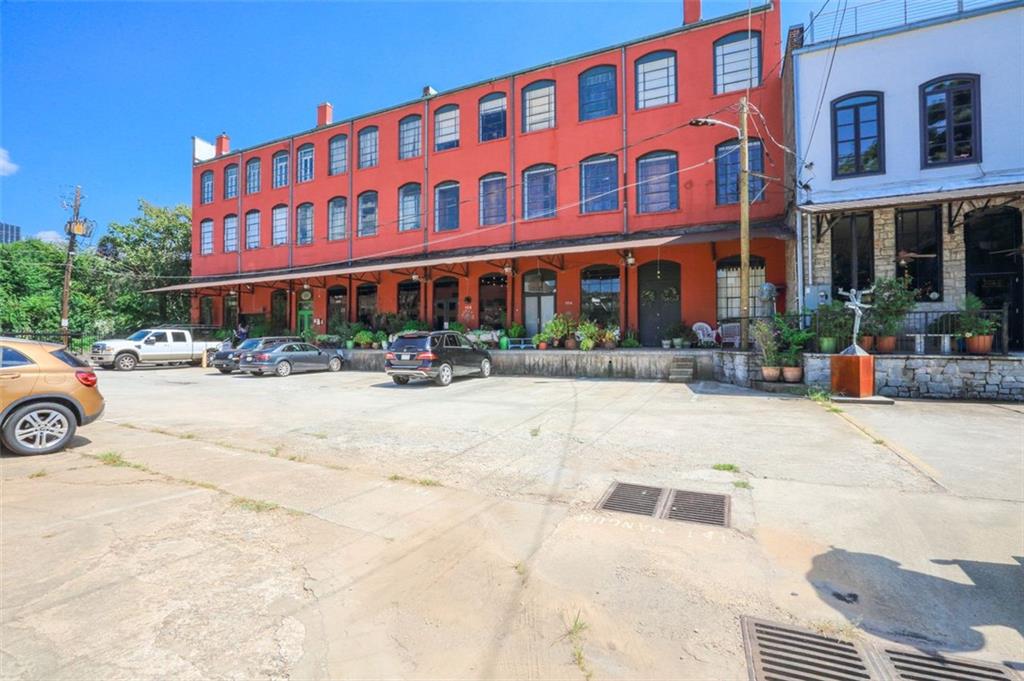 161 Mangum Street Southwest, Unit 302 Atlanta, GA 30313 - Photo 32 of 33 a front view of a building with street