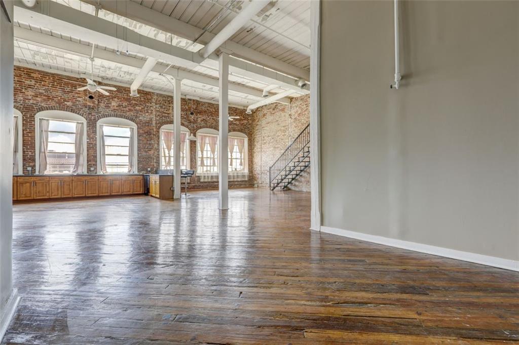 161 Mangum Street Southwest, Unit 302 Atlanta, GA 30313 - Photo 8 of 33 a view of an entryway with wooden floor