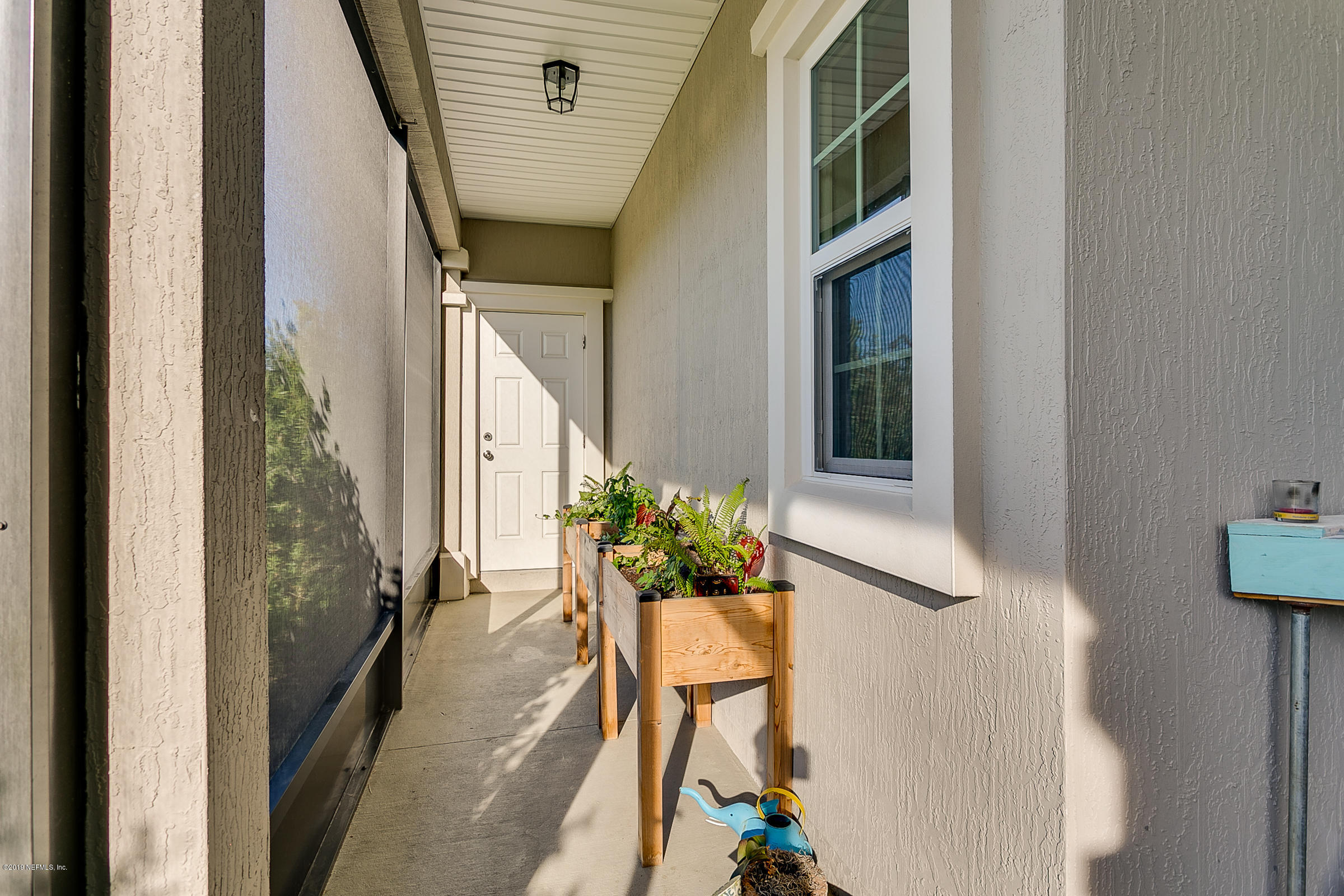 252 Rambling Water Run St. Johns, FL 32259 - Photo 23 of 26 25-Garage Walk-In Entrance View 1
