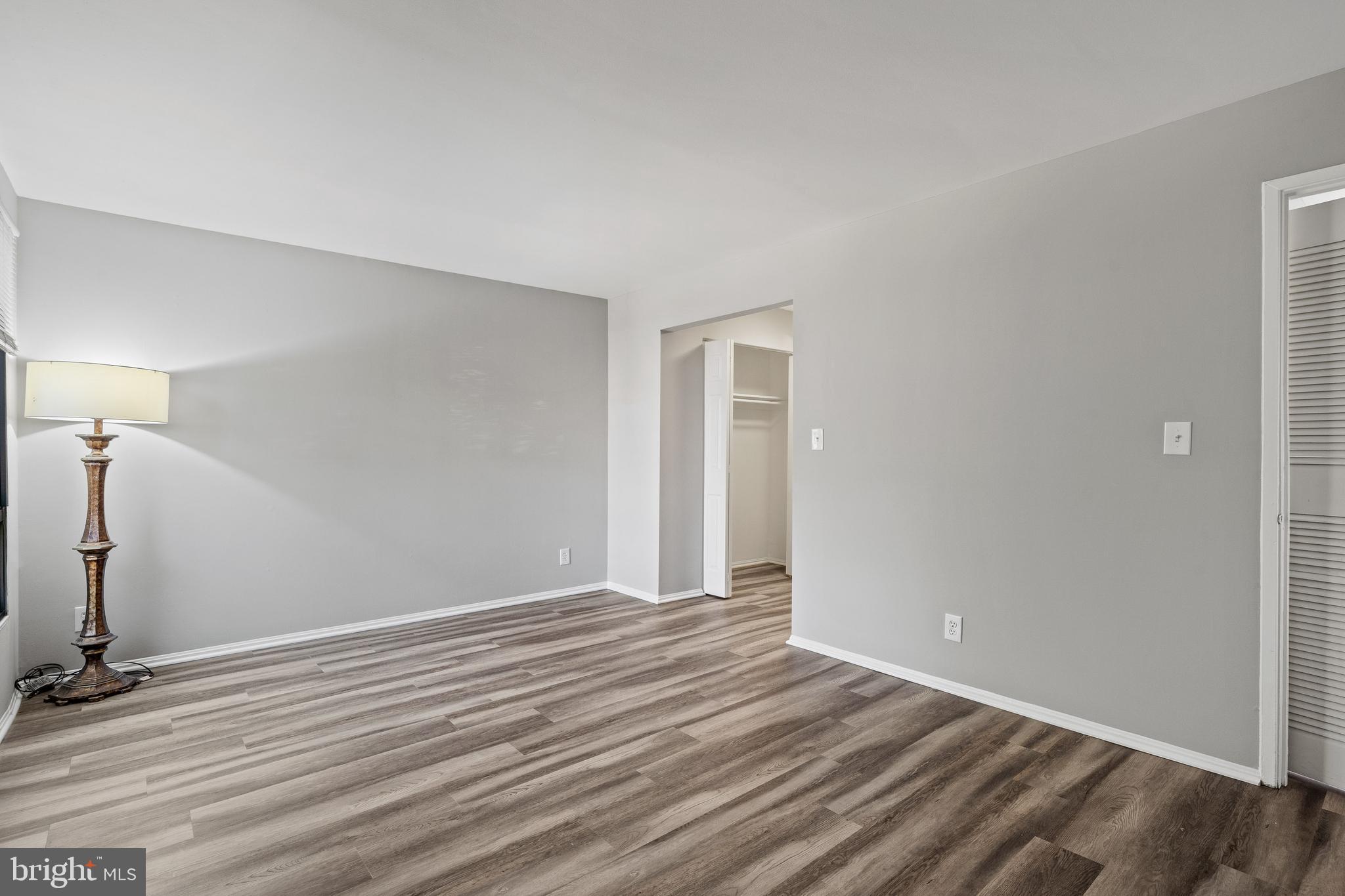 7804 Inverton Road, Unit 201 Annandale, VA 22003 - Photo 12 of 16 wooden floor in an empty room