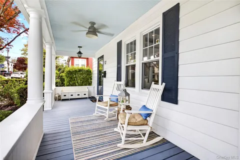 a view of a chairs and table in a patio