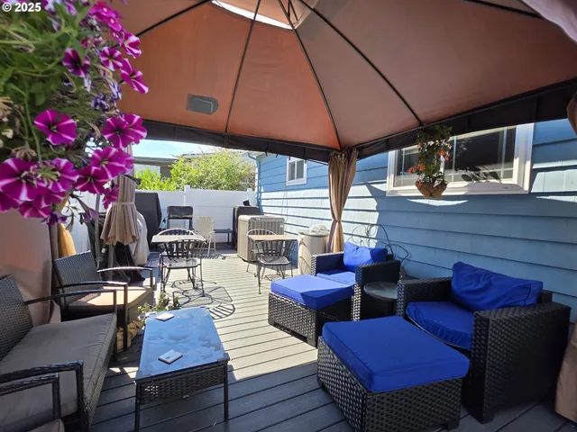 a view of a porch with furniture