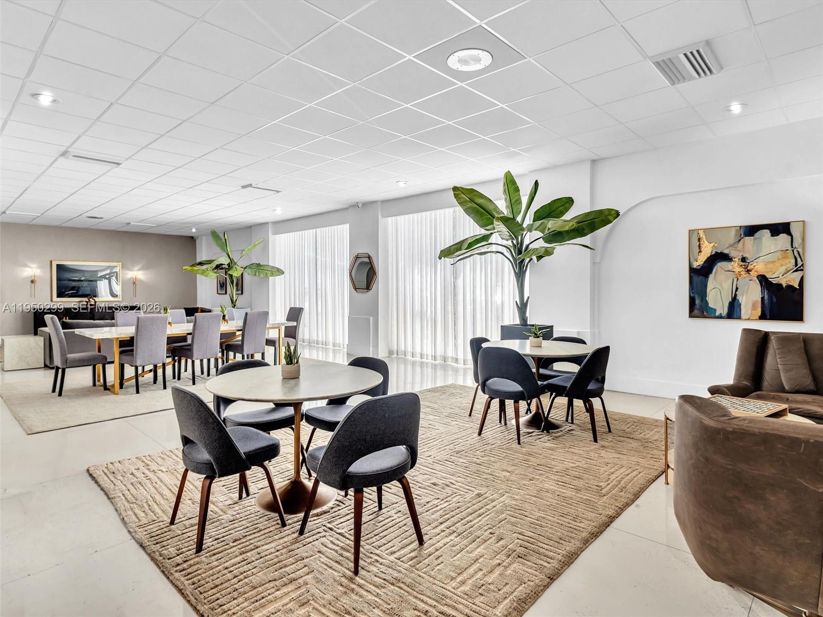 3140 South Ocean Drive, Unit 206 Hallandale Beach, FL 33009 - Photo 54 of 80 a view of a dining room with furniture and wooden floor